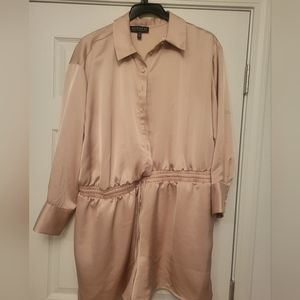 Tan satin like romper from Eloquii.